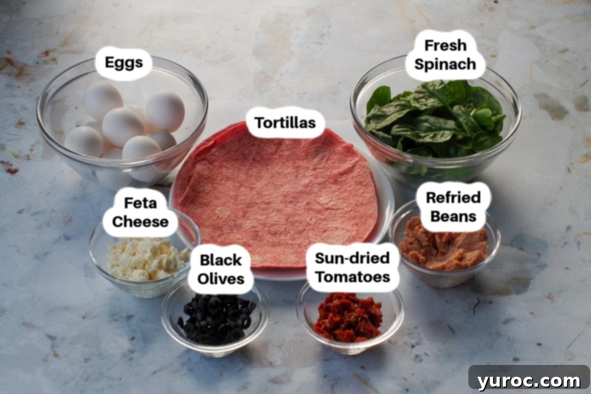 Mediterranean Breakfast Burrito ingredients in glass bowls, labelled.
