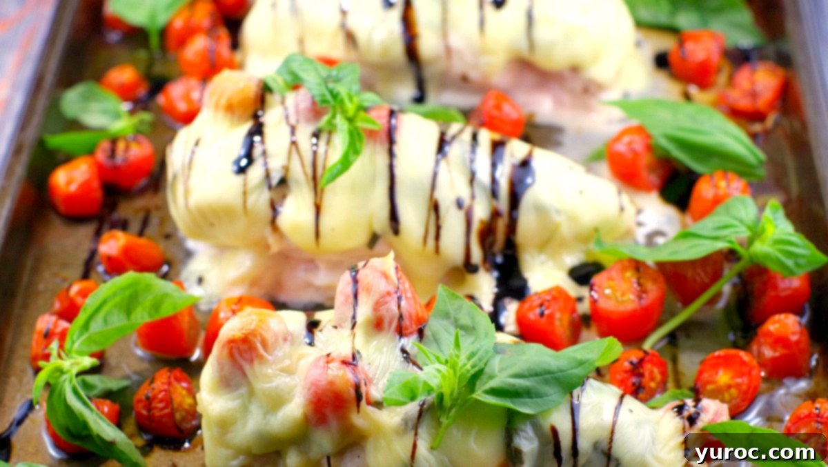 Caprese Sheet Pan chicken breast recipe | 30-minute oven baked chicken with mozzarella, basil, and tomatoes