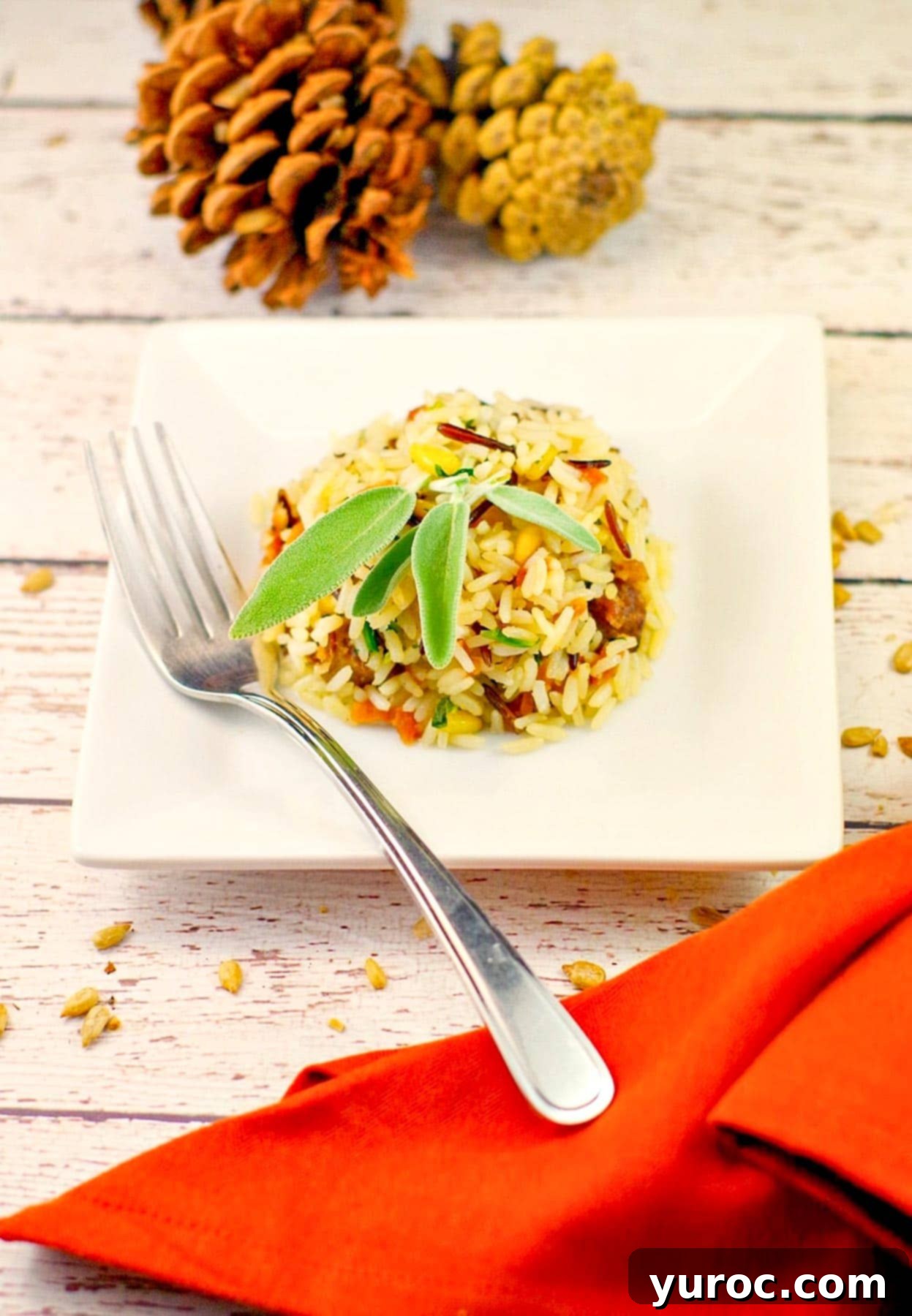 Beautifully shaped apple rice with sausage on a white plate, garnished for presentation