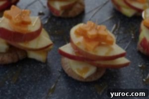 caramel sauce drizzled over apple pie bites