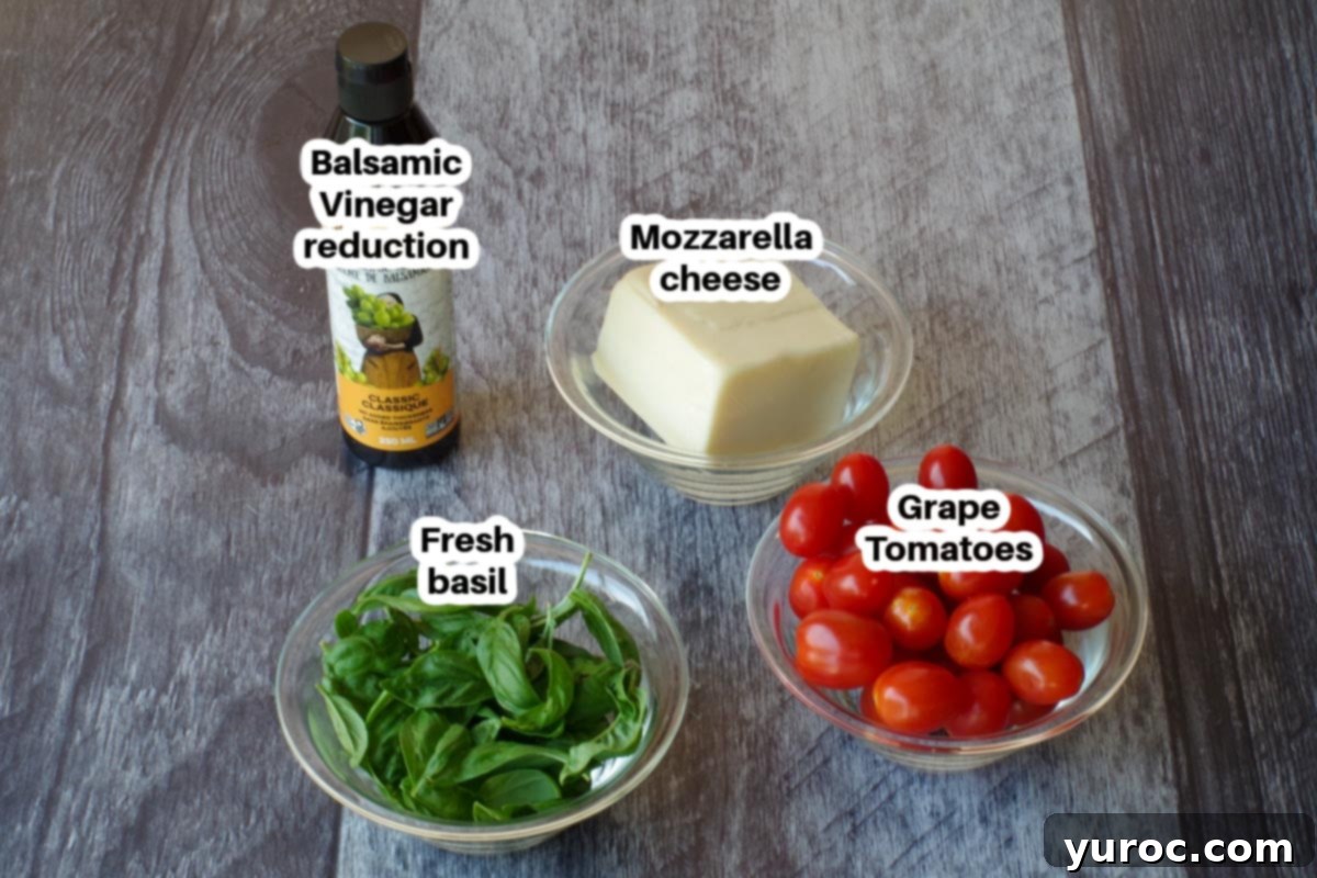 caprese salad stick ingredients in glass bowls, labelled