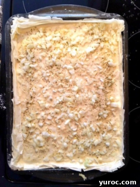 Greek Phyllo Vegetable Tart 4 Phyllo pizza making step 4: Repeating phyllo layers