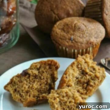 15 Deliciously Healthy Bran Muffin Recipes 10 A Healthy Date Bran Muffin, beautifully broken into pieces on a pristine white plate, with more enticing date bran muffins nestled in the background, ready to be enjoyed as a wholesome treat.