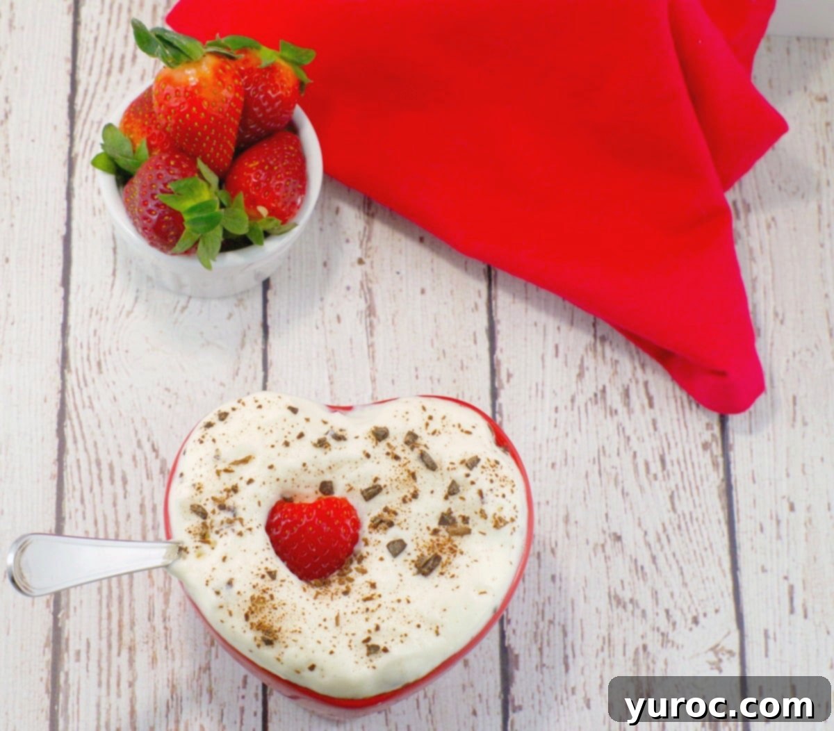 Healthy Heart Shaped Valentine's Day Cake with fresh strawberries and chocolate shavings