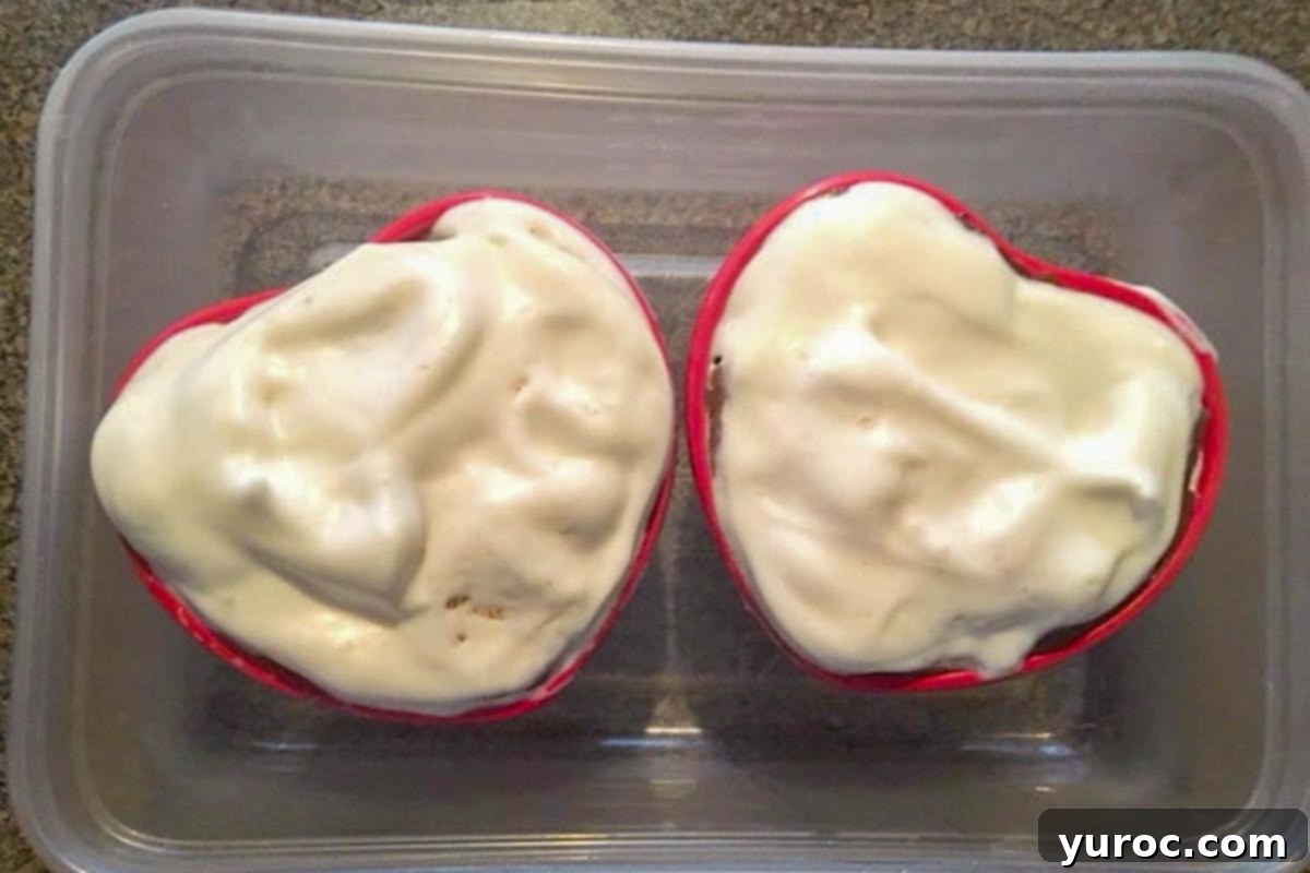 Final evaporated milk whipped cream topping on the heart-shaped icebox cake