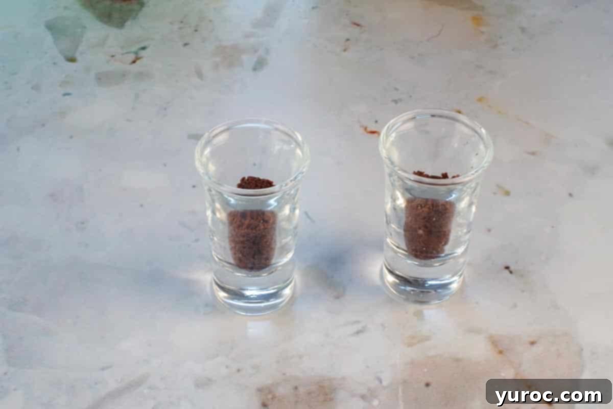 St. Patrick's Day Shamrock Irish Cream Shots 12 2 bite brownies pressed into the bottom of 2 shot glasses