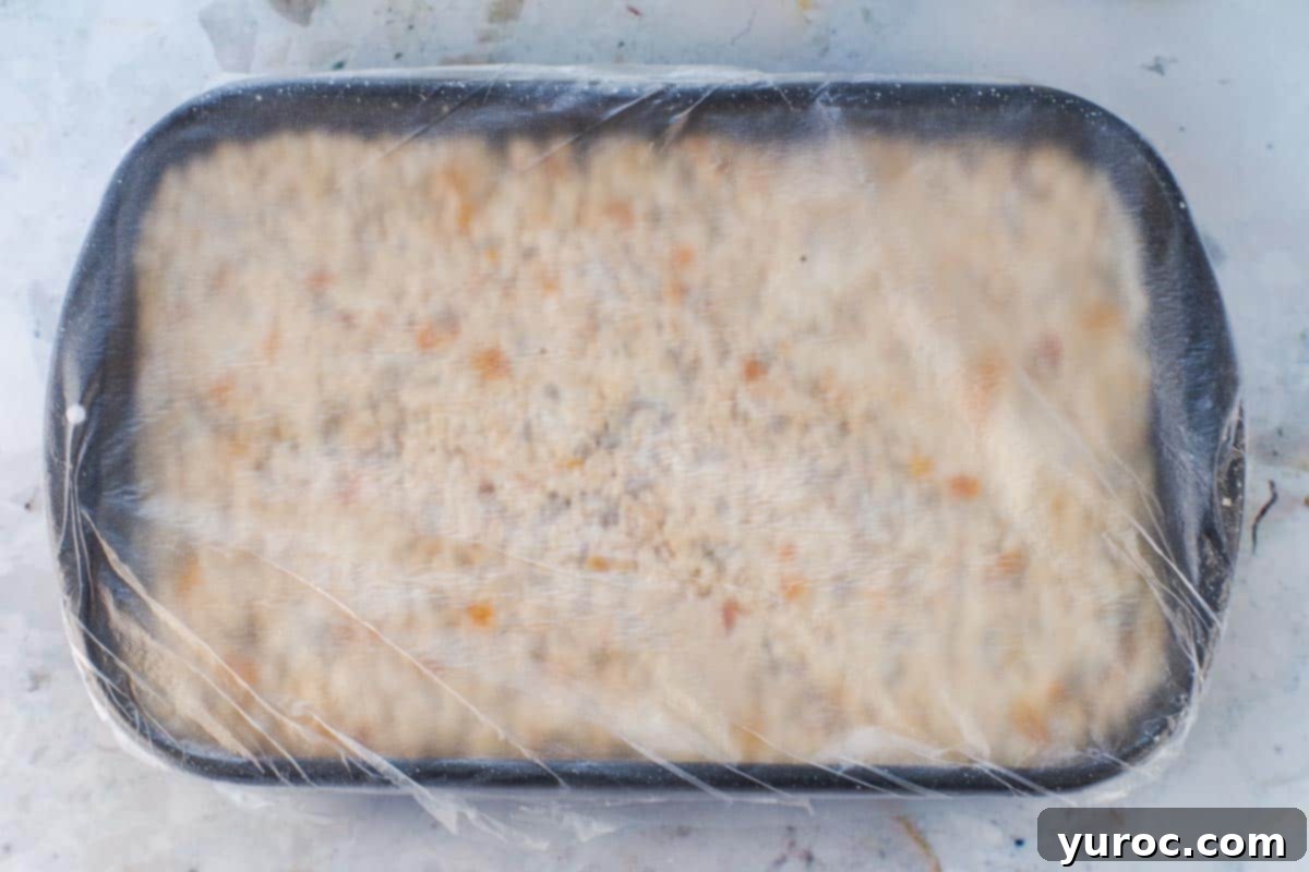 Rice Krispie treats covered in plastic wrap.