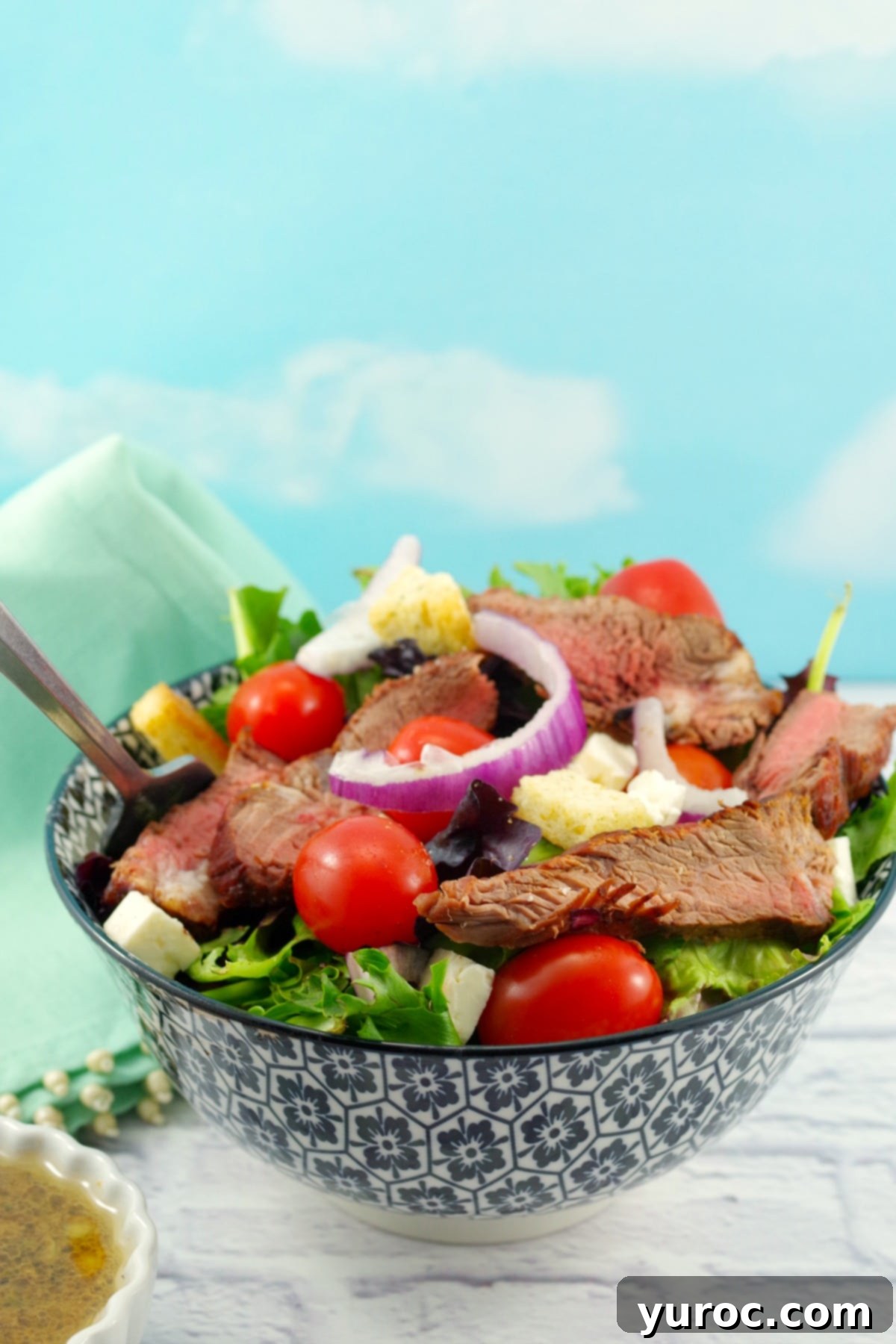 Grilled Steak Salad with feta and clamato dressing, Weight Watchers friendly, beautifully plated.