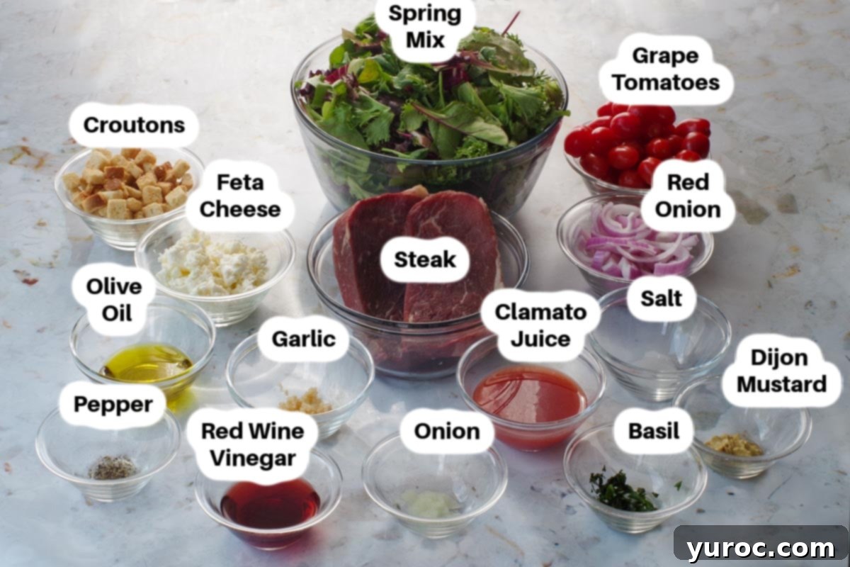 Labeled glass bowls displaying ingredients for Grilled Steak Salad with Feta