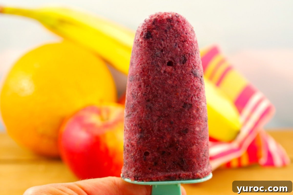 Vibrant Sugar-Free Fruit Popsicles made from real fruit, perfect for zero-waste eating. -foodmeanderings.com
