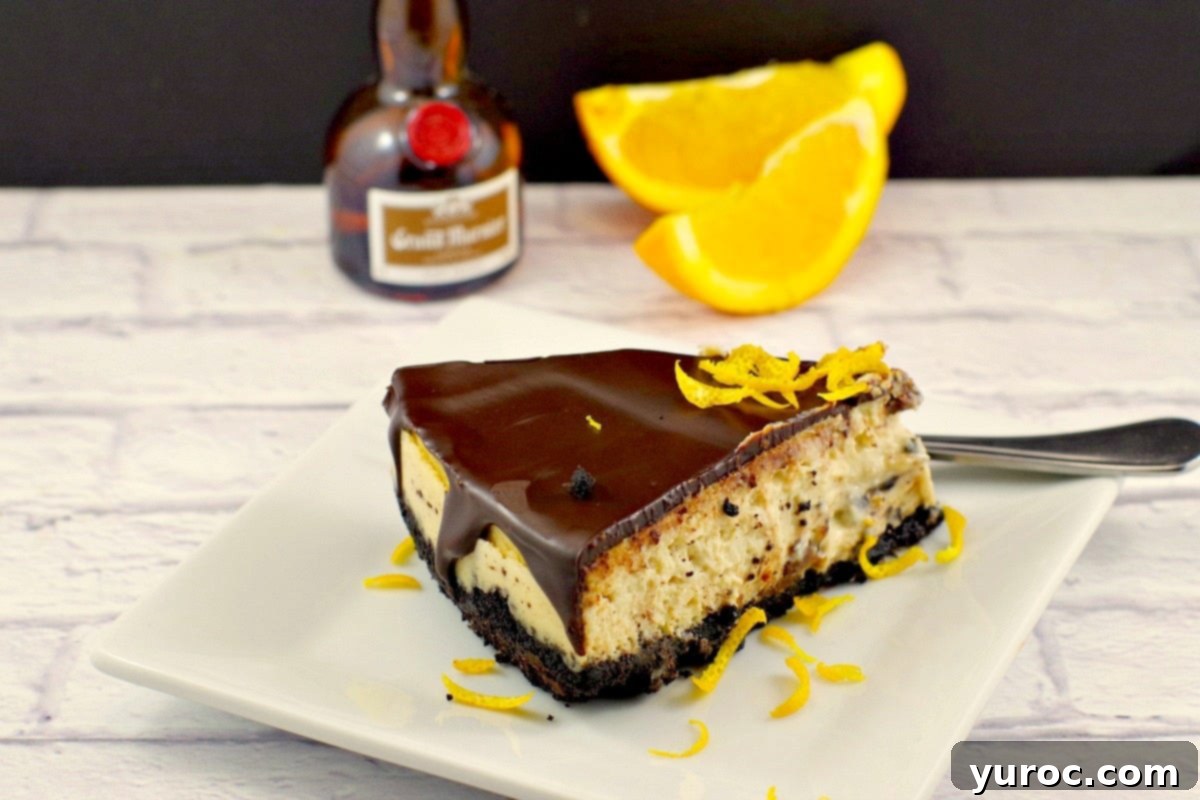 Baked Orange Grand Marnier Cheesecake | with chocolate glaze -foodmeanderings.com