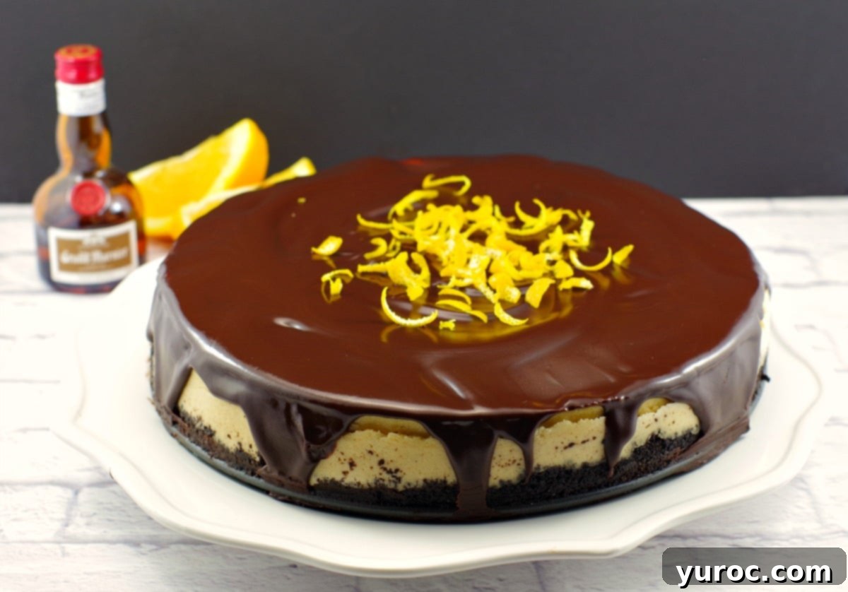 Grand Marnier Cheesecake| with chocolate glaze - foodmeanderings.com 