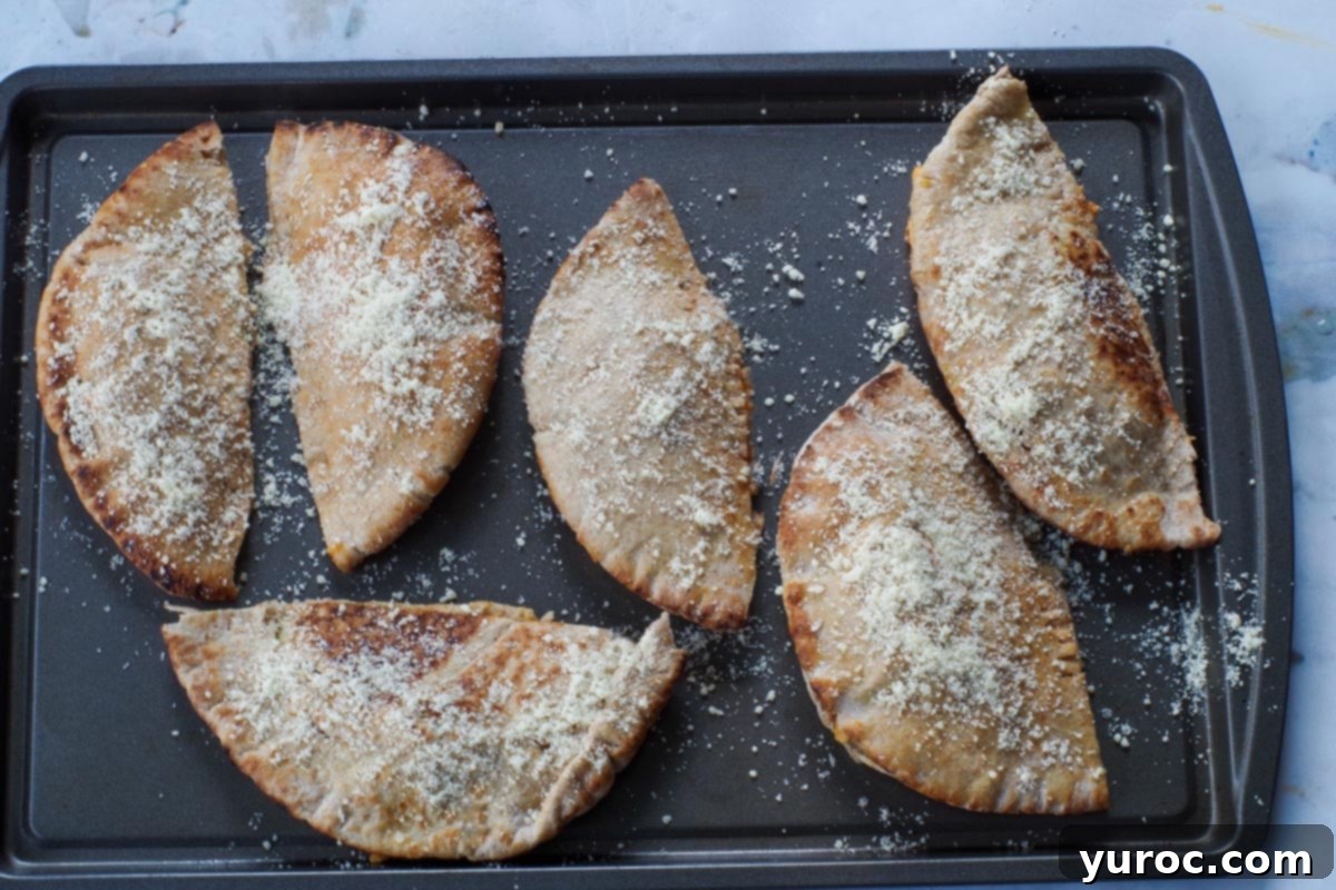 Wholesome Pita Pizza Pouches 11 Parmesan cheese generously sprinkled over the hot pockets/pizza pockets before baking.