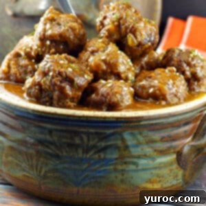 Sticky Sweet and Sour Slow Cooker Meatballs 14 slow cooker sweet and sour meatballs in a hand made pottery serving bowl