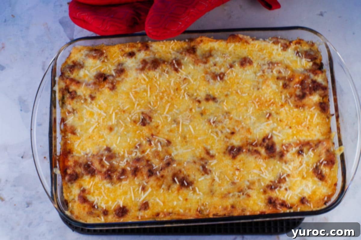 Prep-Ahead No-Boil Lasagna 14 Baked lasagna in a glass baking pan, ready to be served