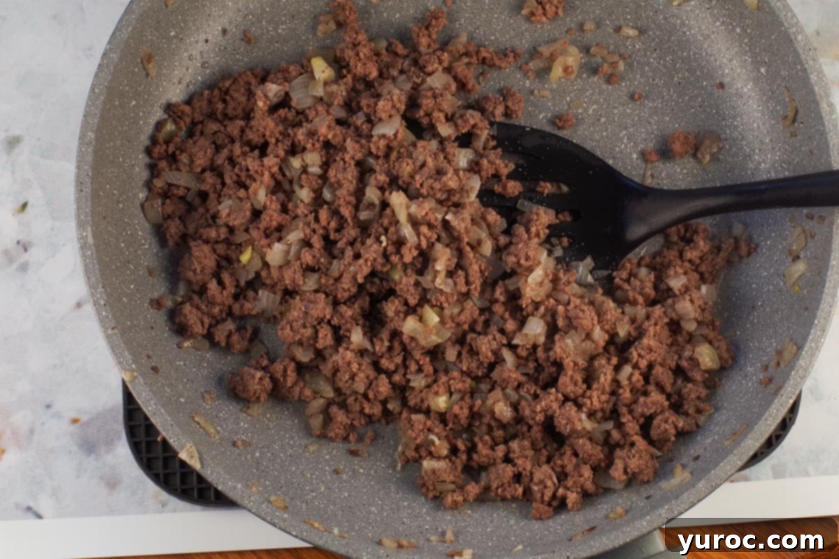 Prep-Ahead No-Boil Lasagna 3 Ground beef cooked with onion in a skillet until browned