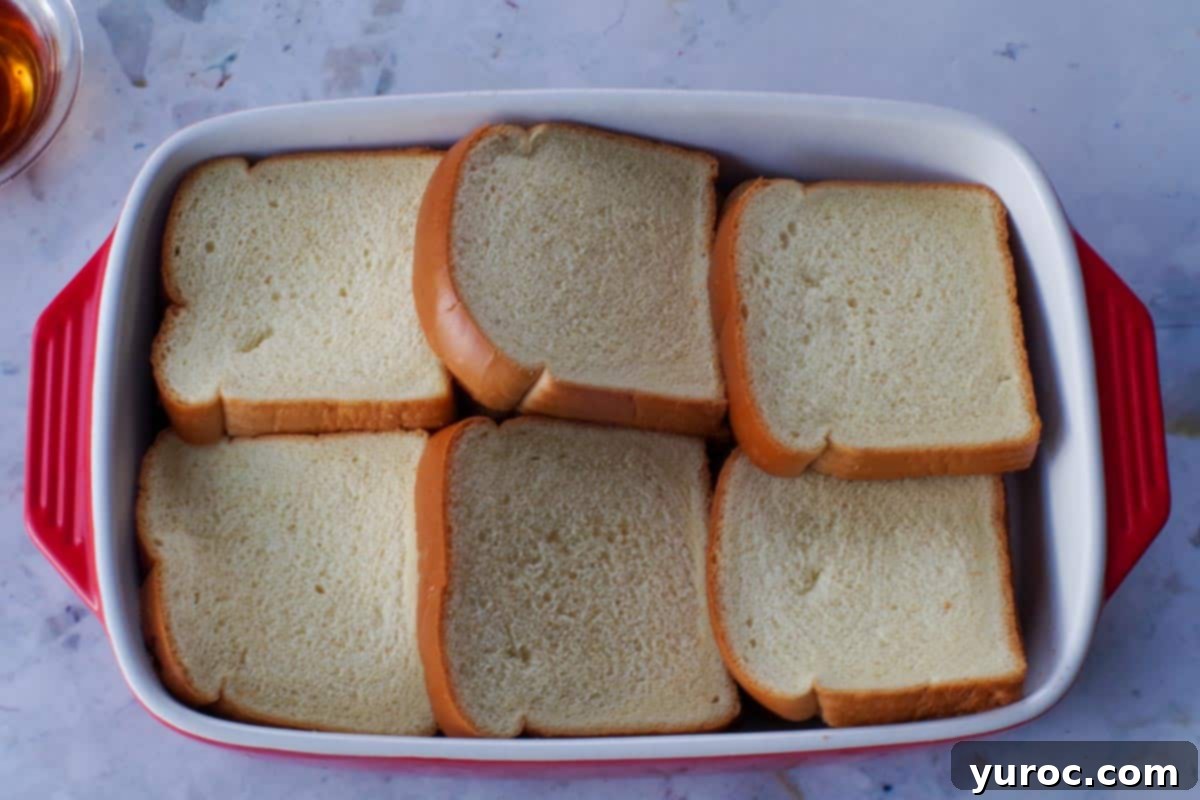 2nd row of bread added to casserole dish.