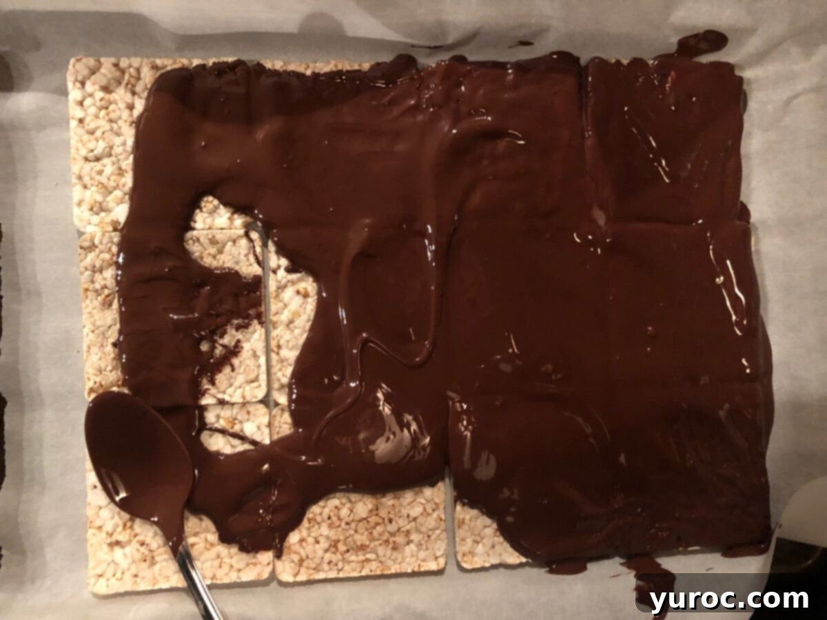 Directions for preparing No Bake Healthy Chocolate Rocky Road Bars, showing melted chocolate over rice cakes