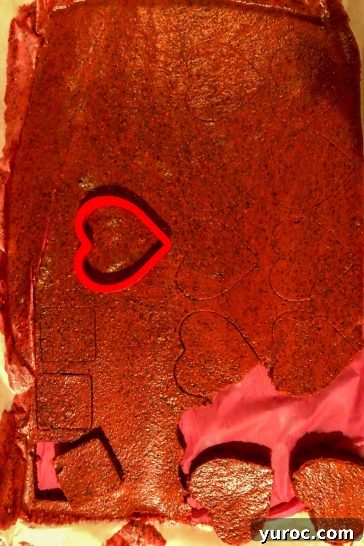 shapes being cut out of jello on sheet pan