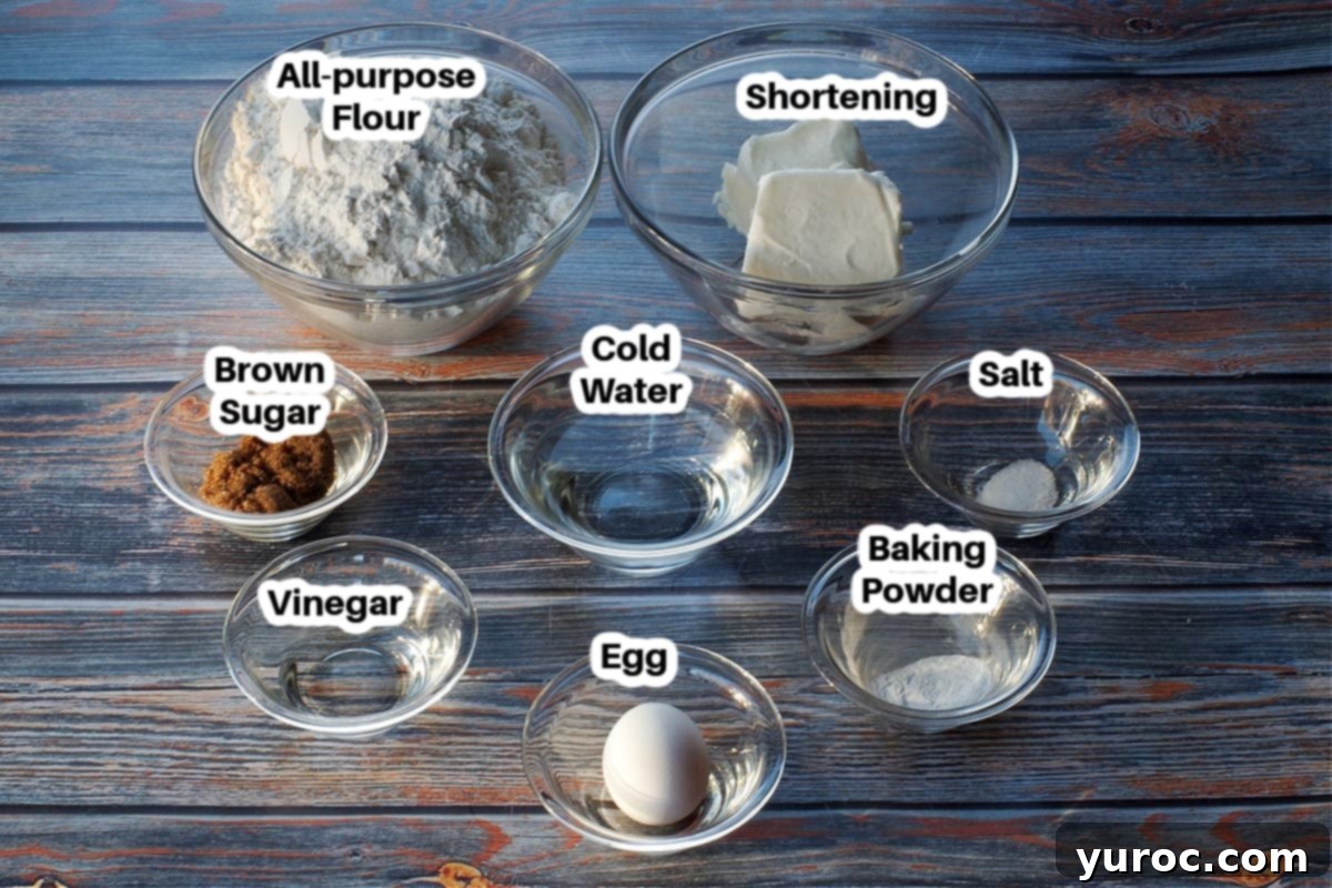 Labeled ingredients for no-fail pie crust in glass bowls