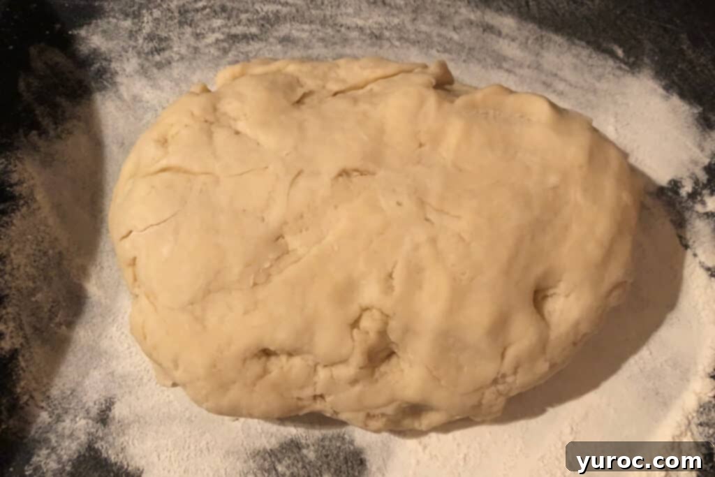 Pie crust dough on a lightly floured cutting board