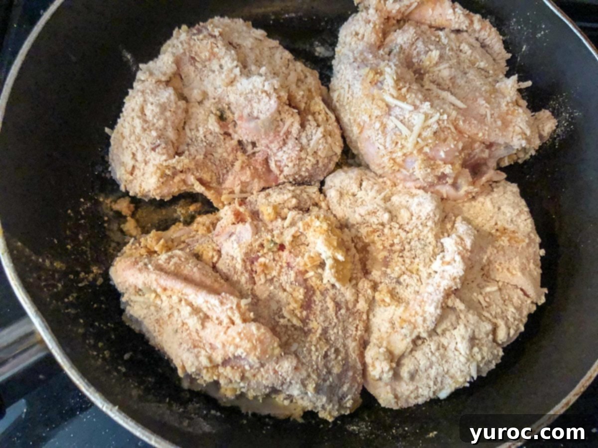 chicken on hot skillet