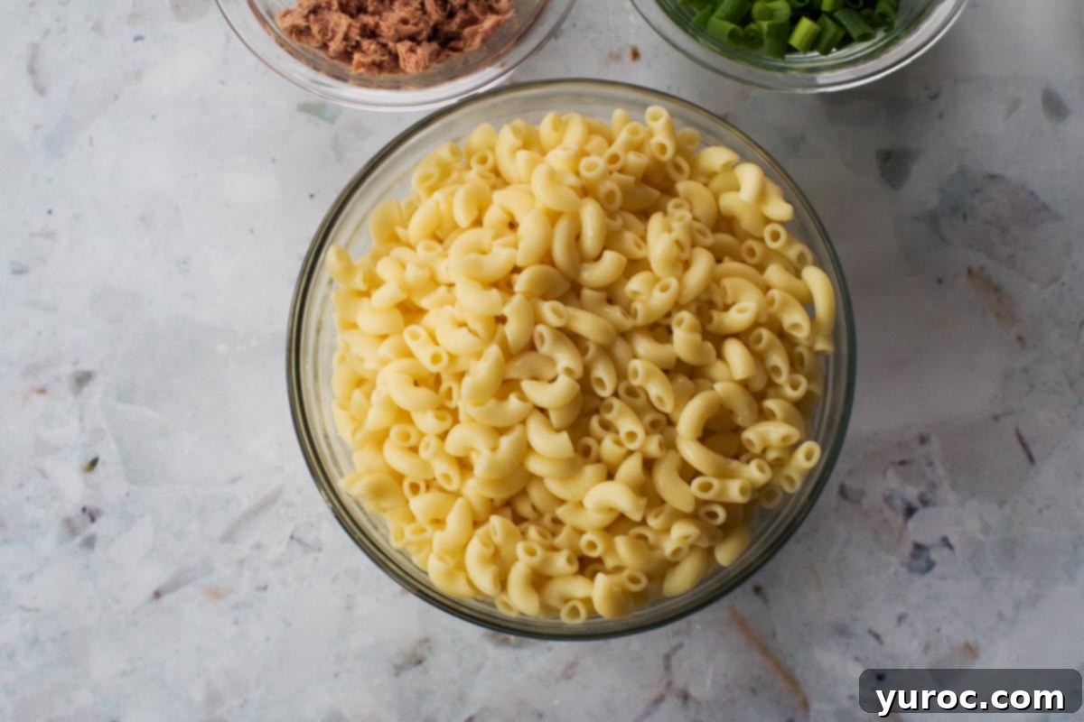 Wholesome Tuna Macaroni Salad 6 Cooked macaroni in a glass bowl.