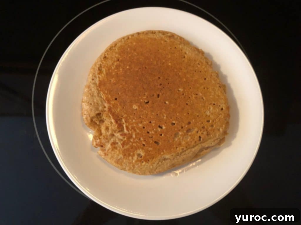 Finished IHOP copycat harvest grain and nut pancake on a white plate