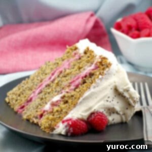 Lemon Poppy Seed Torte with Raspberry Curd and White Chocolate Whipped Cream 5 a slice of lemon poppy seed cake with raspberry filling
