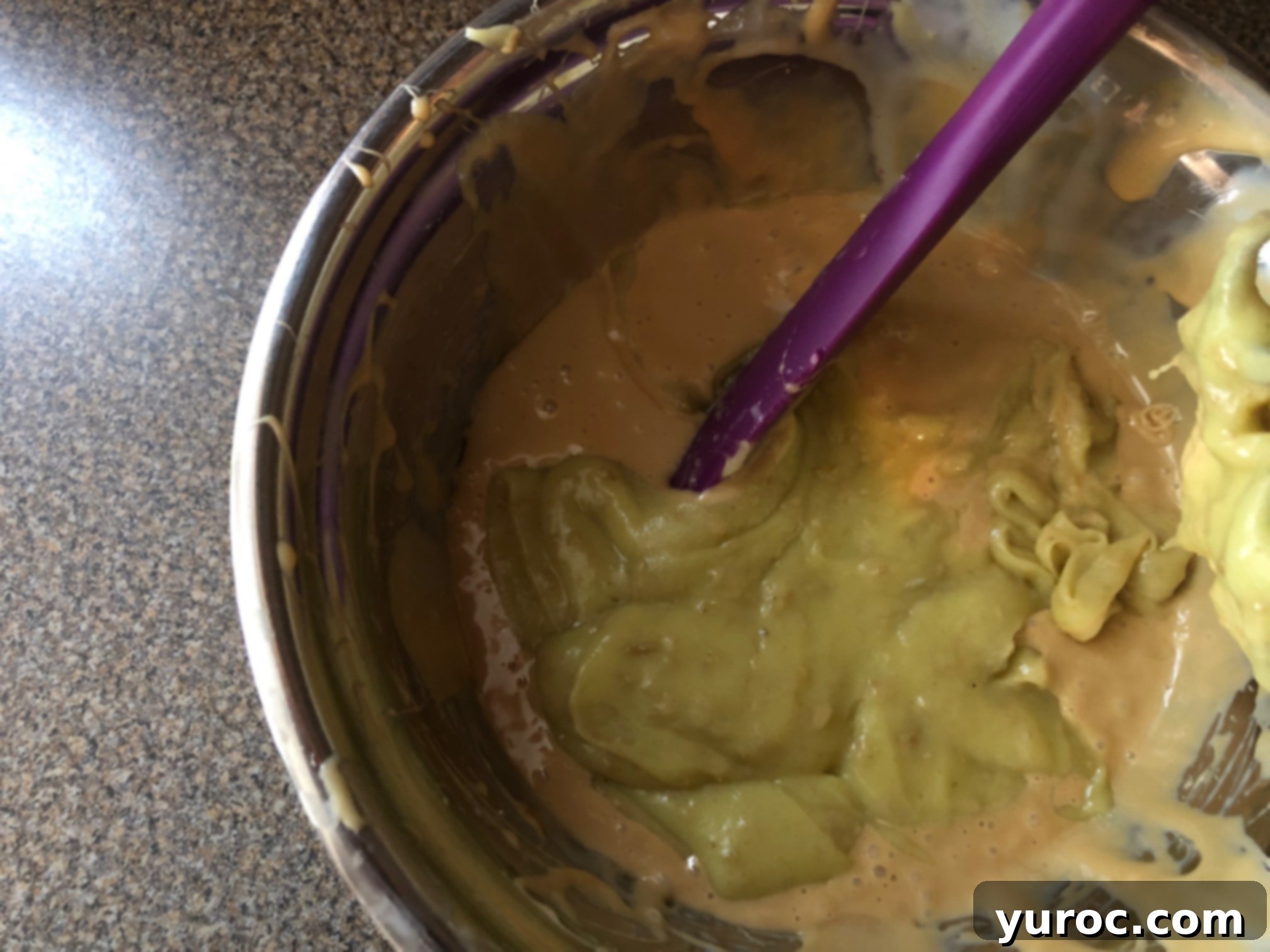 No Churn Potato Cookies and Cream Delight 9 Potato mixture being gently folded into whipped cream with a spatula