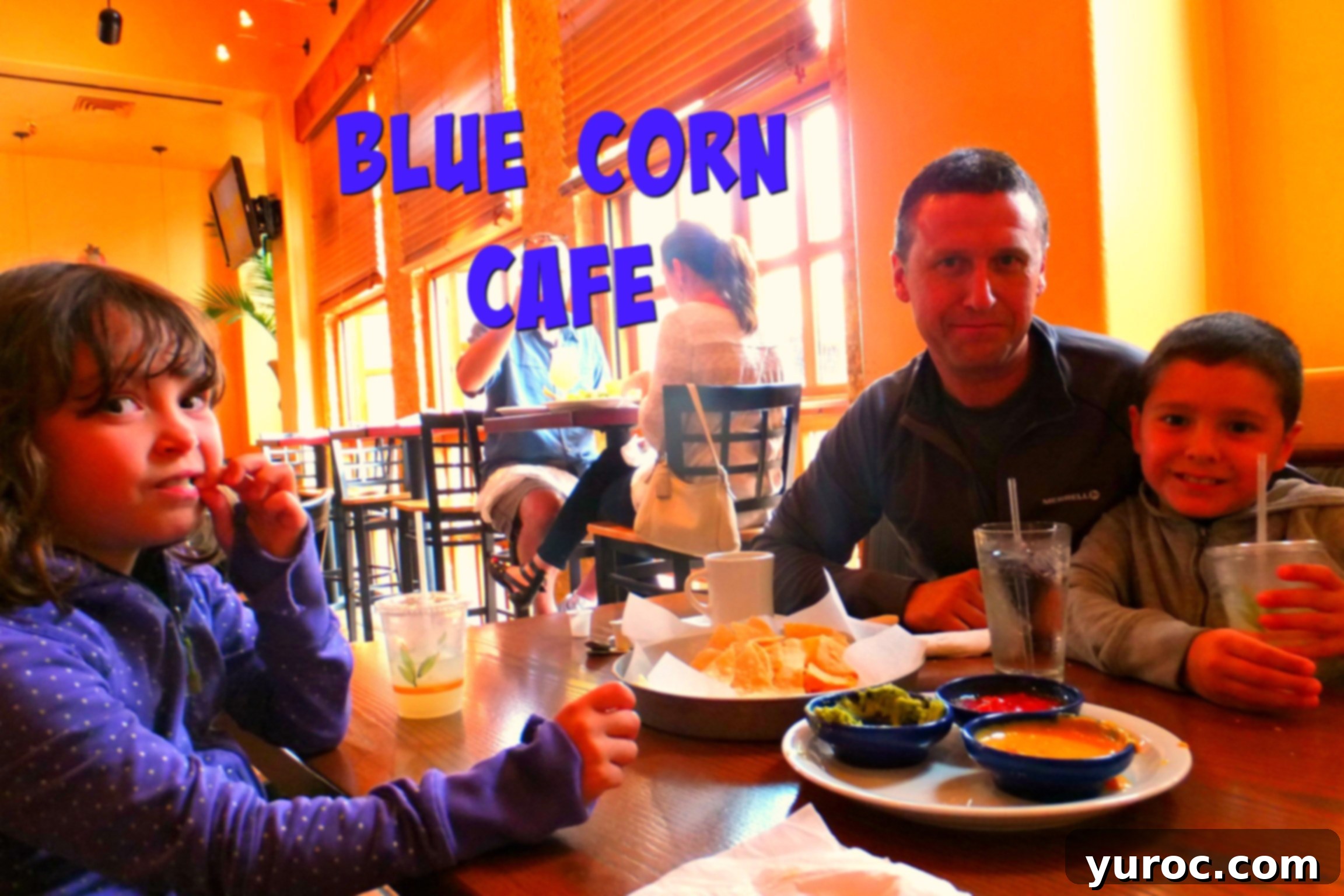 Family enjoying a meal at the Blue Corn Cafe in Santa Fe, New Mexico