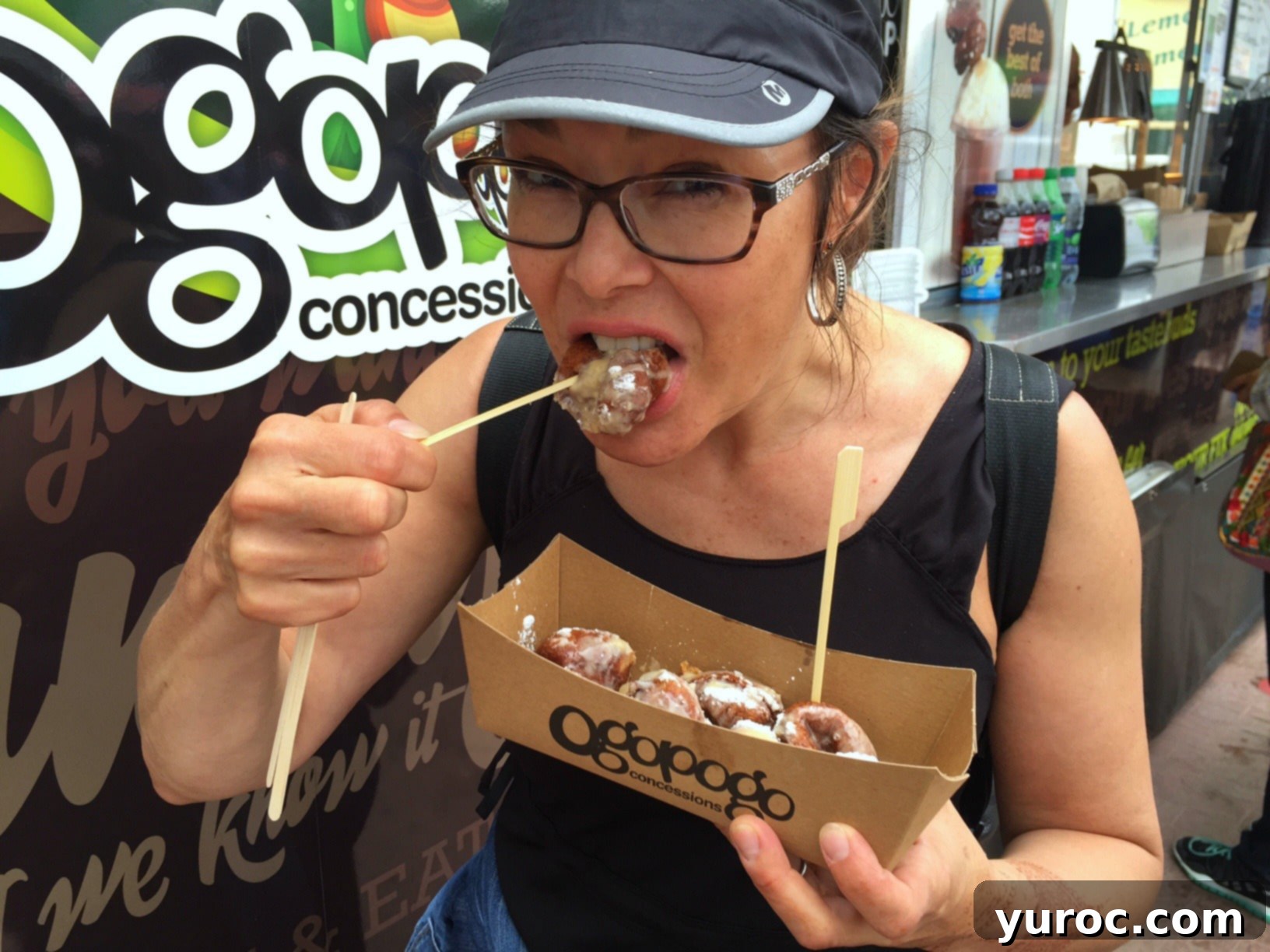 Person eating Deep Fried Coffee at Stampede
