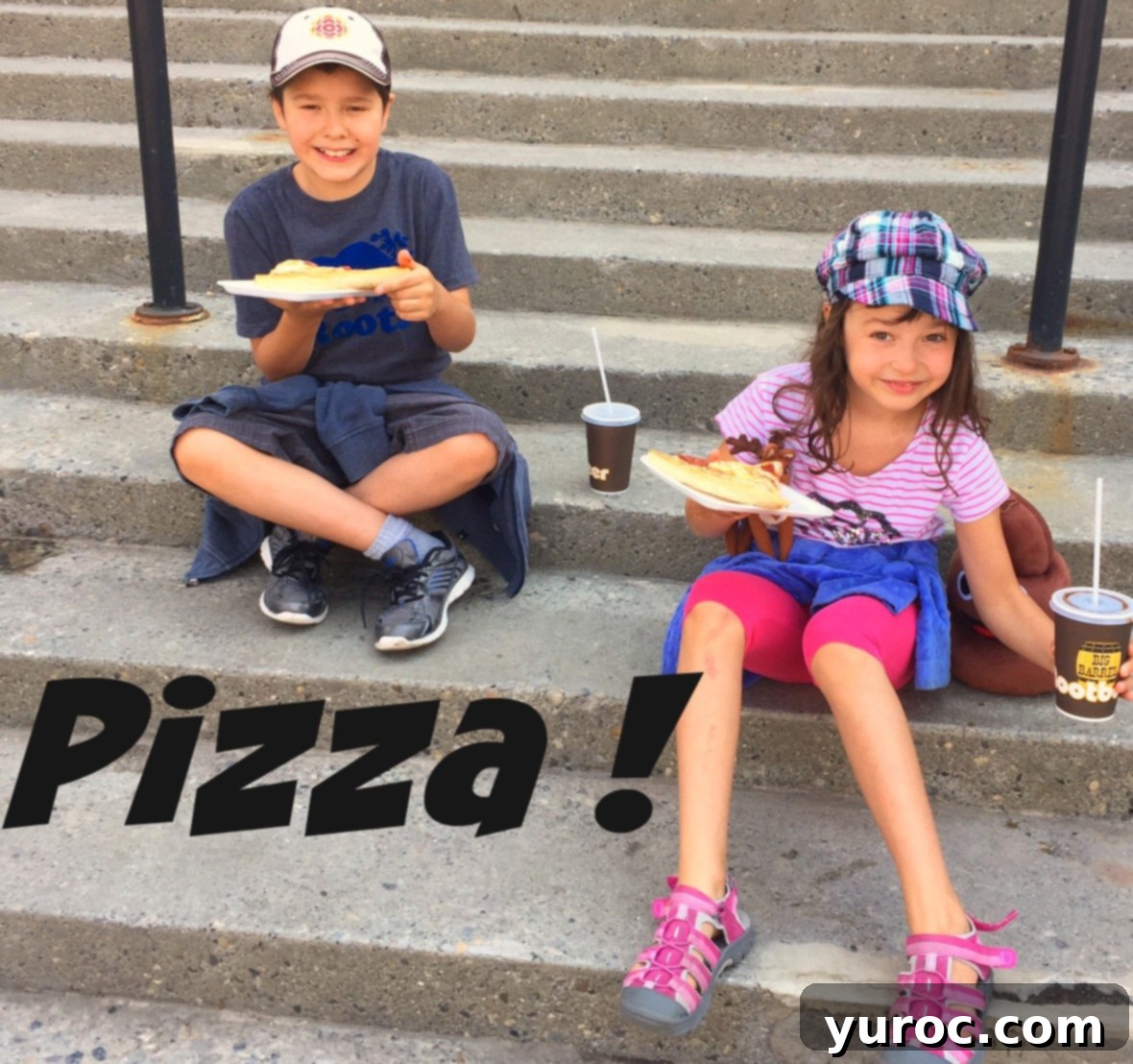 Kids eating pepperoni pizza at Calgary Stampede