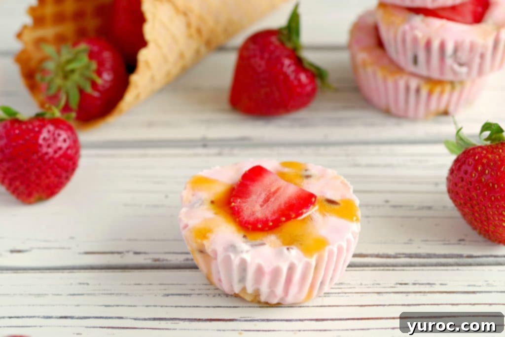Strawberry Cone Crunch Frozen Yogurt Cups 1 Strawberry Drumstick Frozen Yogurt Cups on white table with strawberries and cones in background