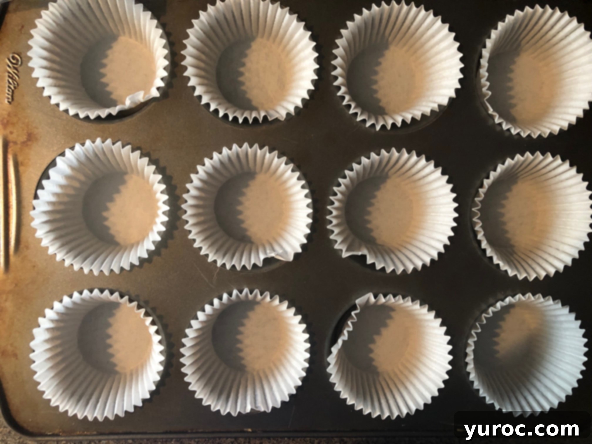 Strawberry Cone Crunch Frozen Yogurt Cups 2 Muffin tin lined with empty paper muffin cups