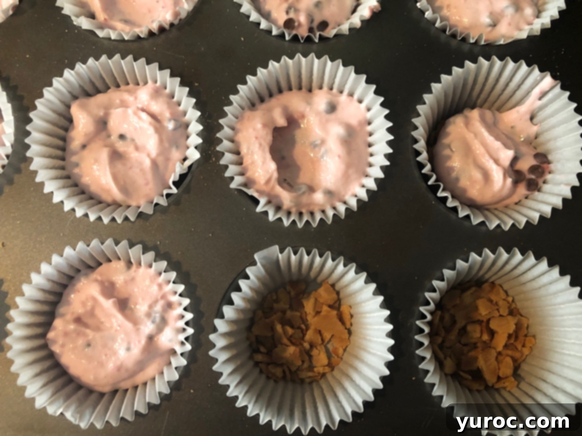 Strawberry Cone Crunch Frozen Yogurt Cups 8 Filling up muffin cups with strawberry yogurt mixture