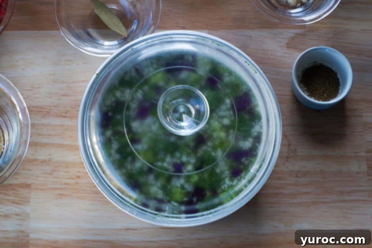 Easy Beef Borscht with Canned Beets 5 broccoli slaw in a microwave safe bowl with a lid