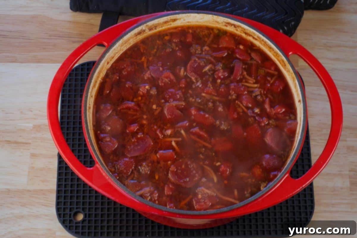 Easy Beef Borscht with Canned Beets 8 cooked borscht in orange Dutch oven