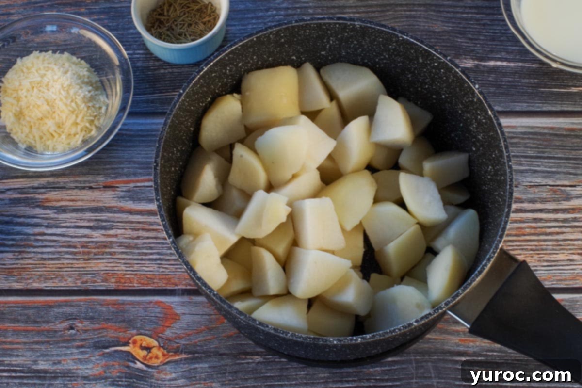 Smart Turkey Shepherd's Pie 4 Chopped potatoes in a pot, cooked and drained, ready for mashing.