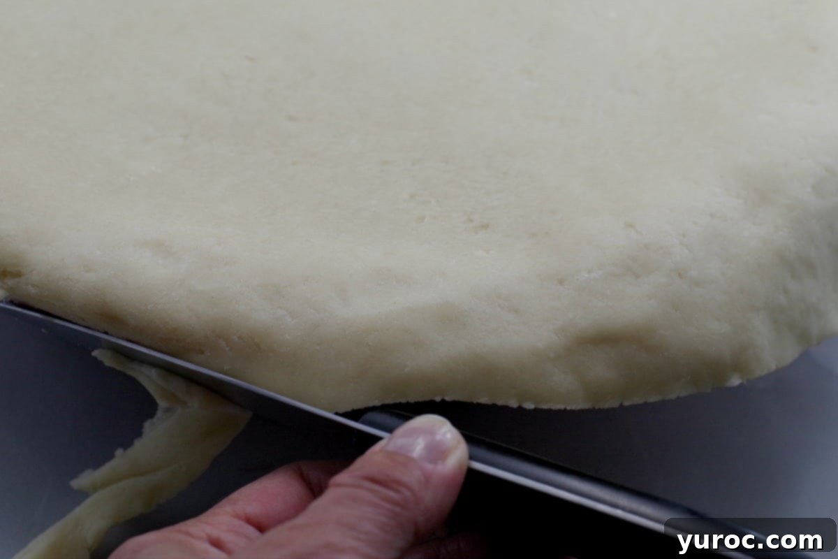 Saskatoon Berry Pie: Mastering the Filling and Sauce 10 pie crust trimmed with paring knife