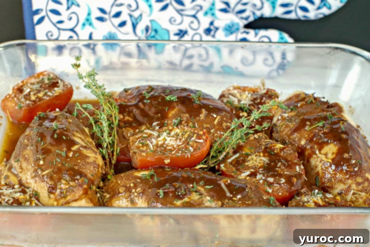 Balsamic chicken with tomatoes in a glass dish