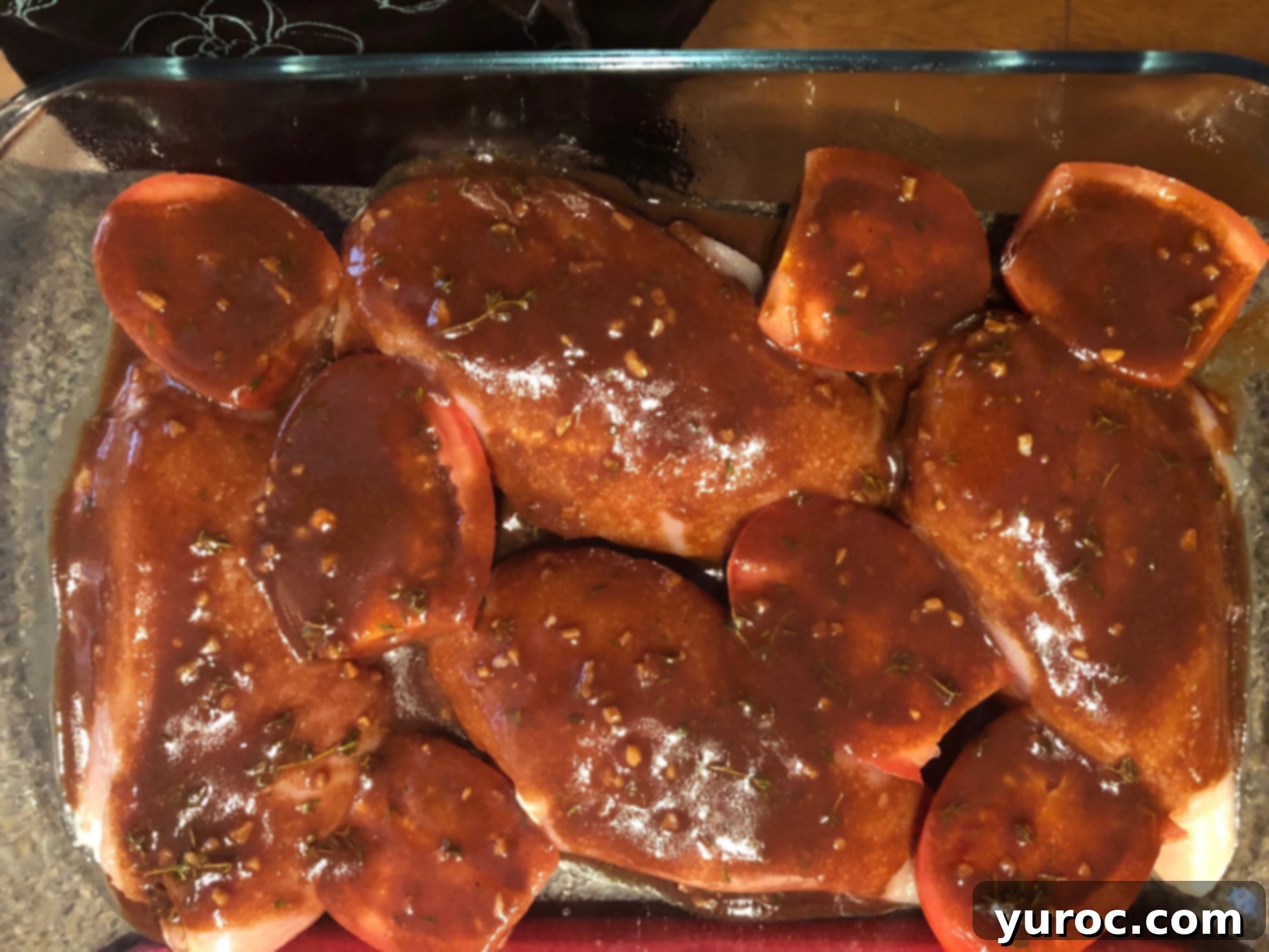 chicken breast with sauce on top