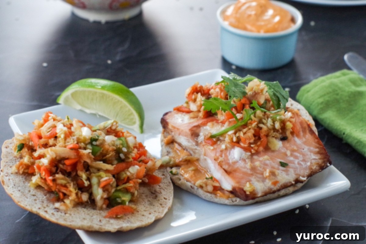 Guilt-Free Coleslaw 4 Baked salmon sandwich topped with Weight Watchers Asian coleslaw, served on a white plate