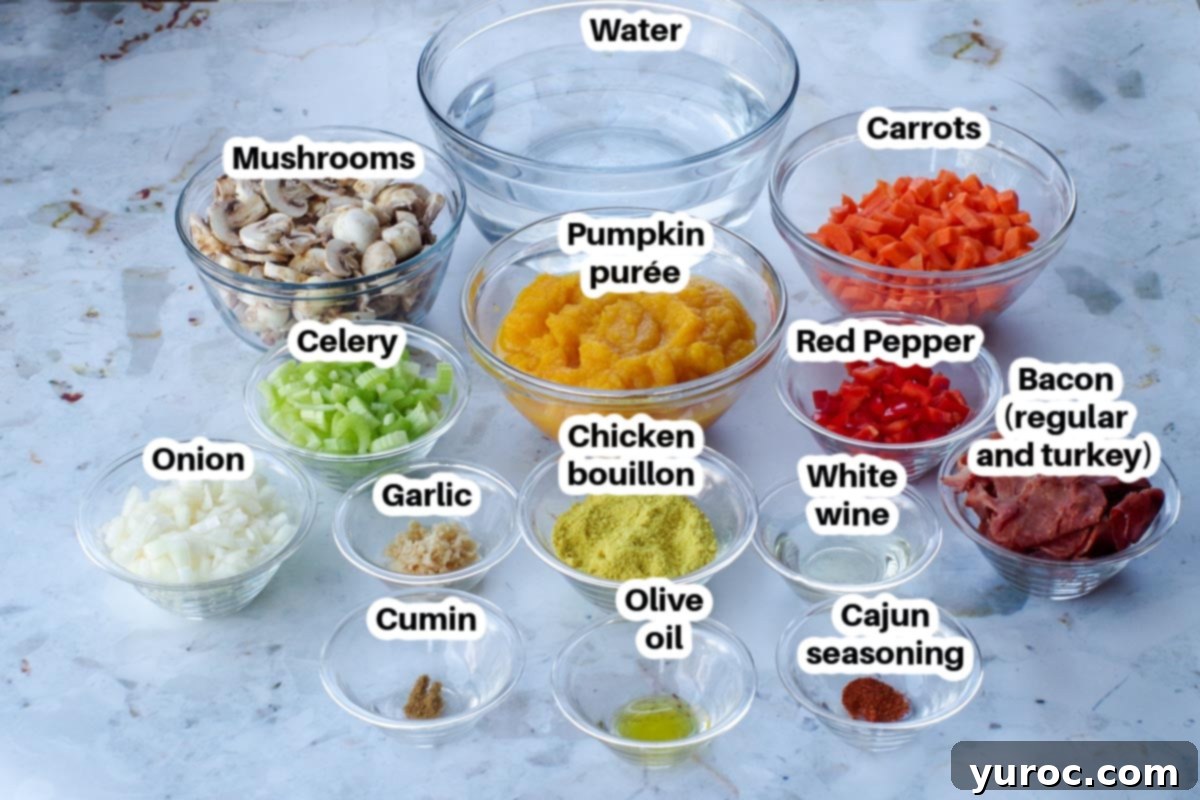 ingredients in pumpkin soup in glass dishes on countertop, labelled