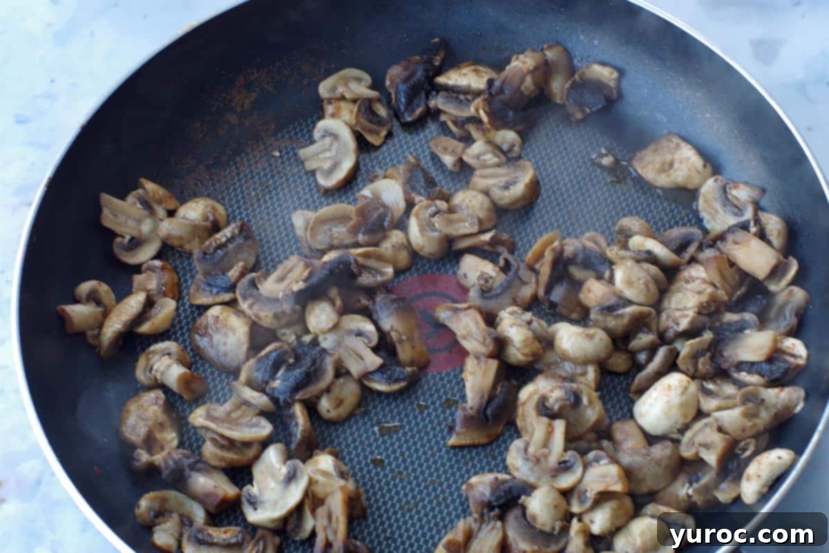 cooked mushrooms in a frying pan