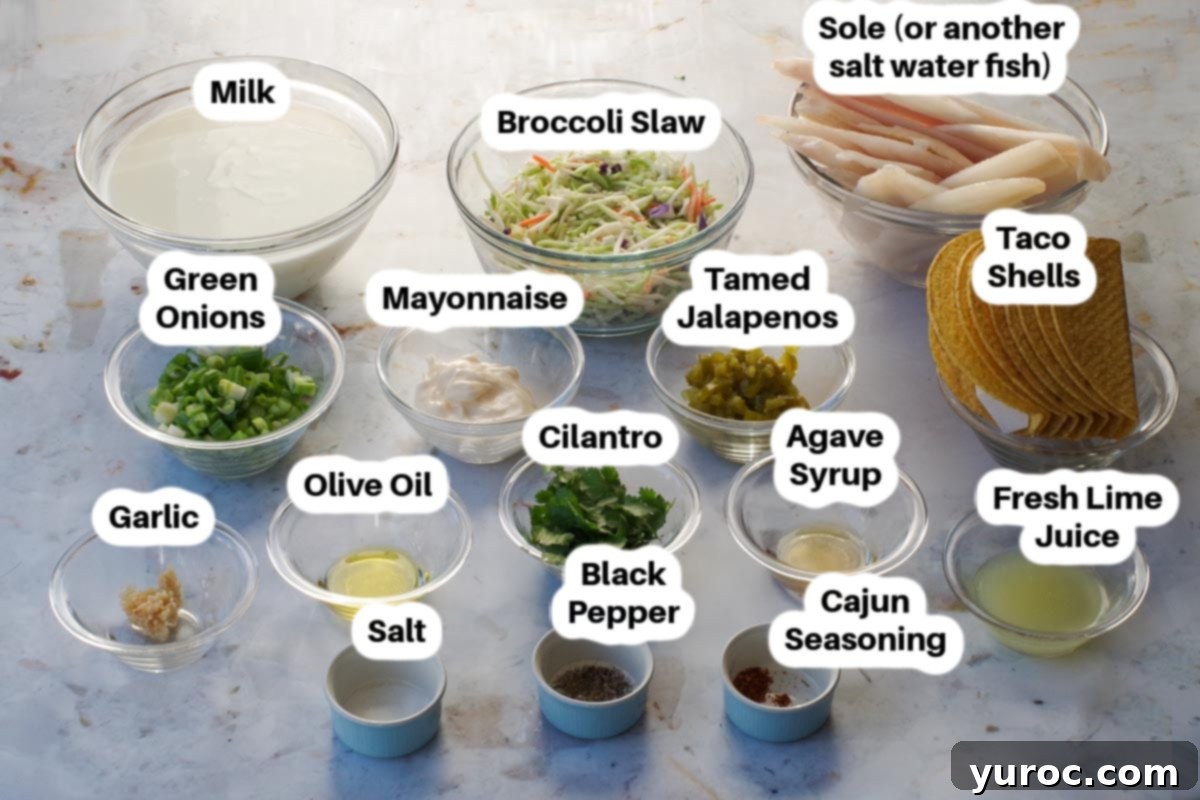 Various ingredients for fish tacos and broccoli slaw, neatly arranged in glass bowls and labeled.