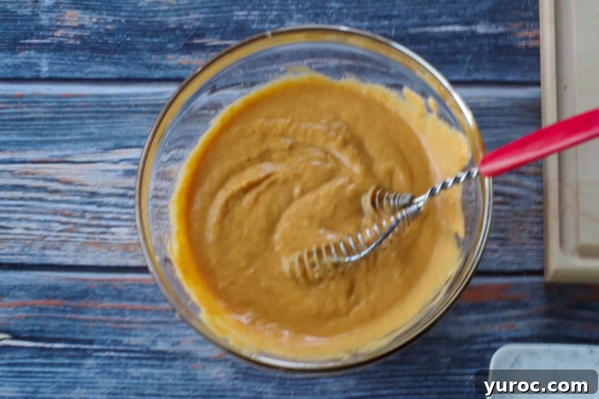 wet ingredients mixed together with whisk in a medium glass bowl