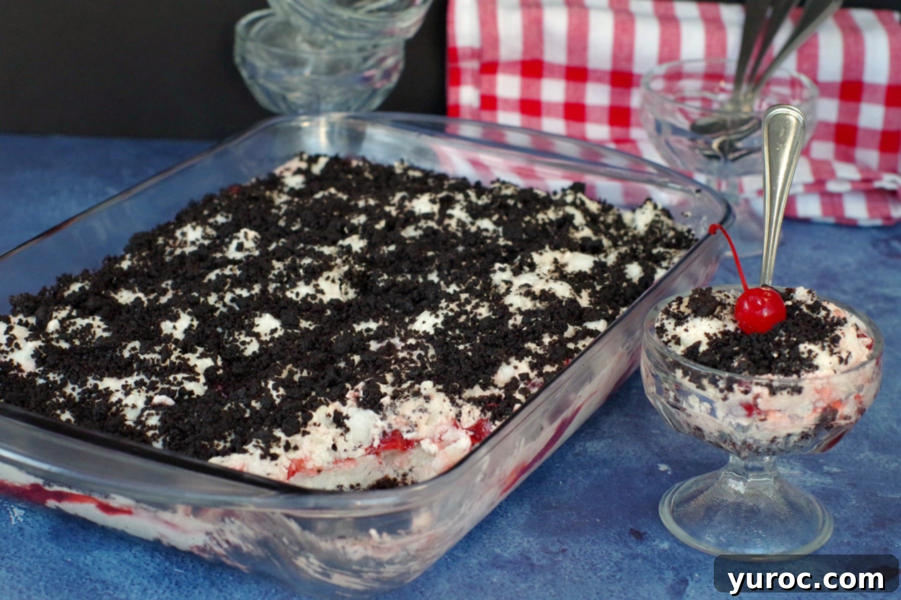 A slice of Cherry Cha Cha dessert, showing all its beautiful layers and inviting texture.