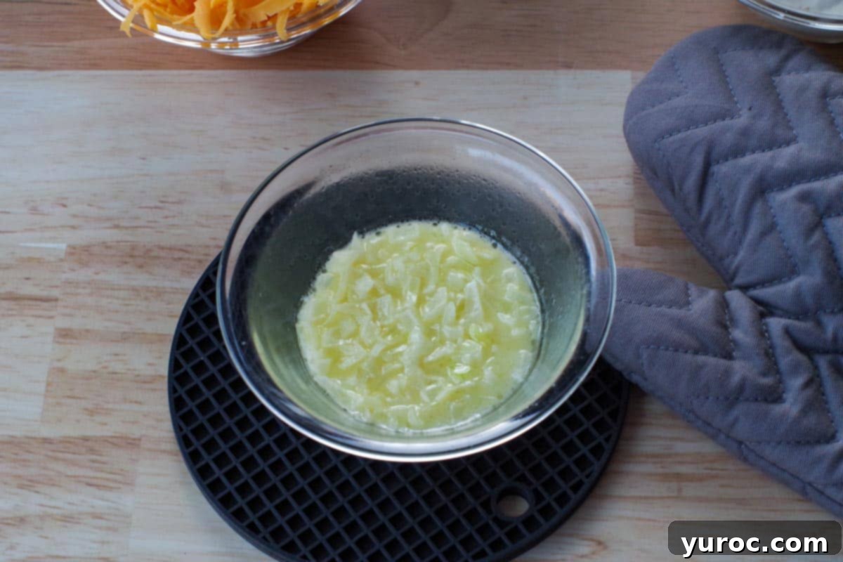 chopped onion cooked in butter in glass bowl