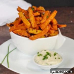 Sweet potato fries and dip in white plate on white bowl